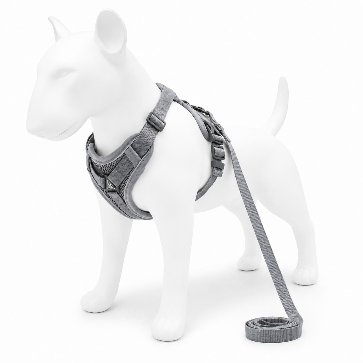 Gray dog harness and leash set on a white dog mannequin