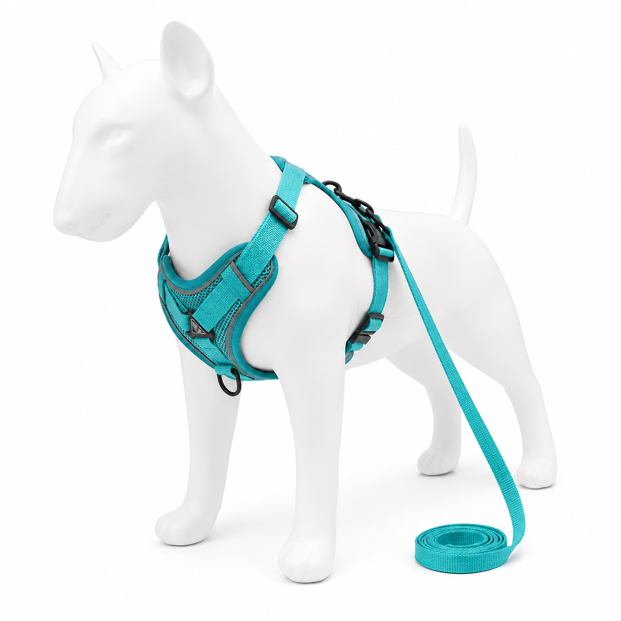 Teal dog harness and leash set on a white mannequin with a white background
