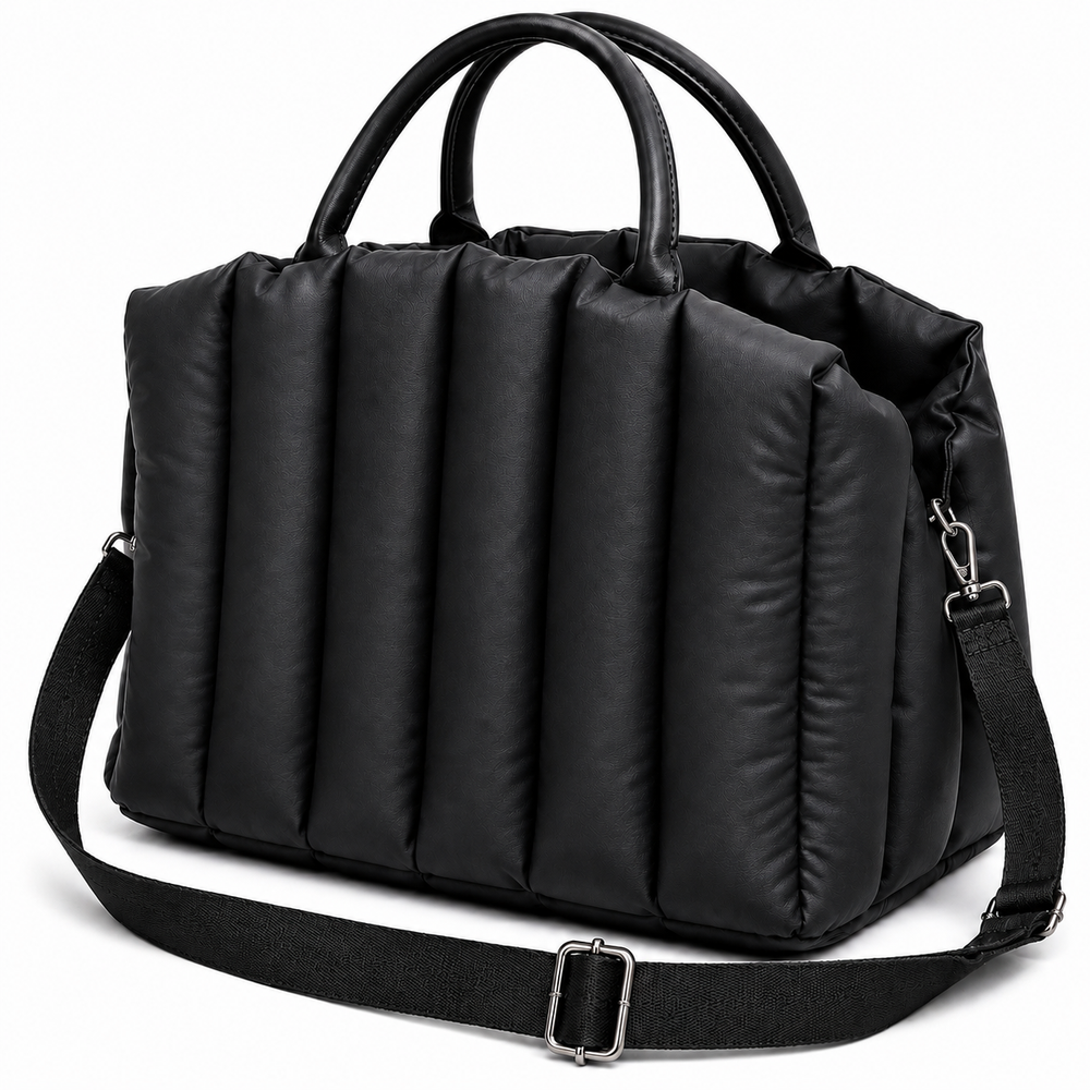 Black duffel bag with handles and a shoulder strap on a white background