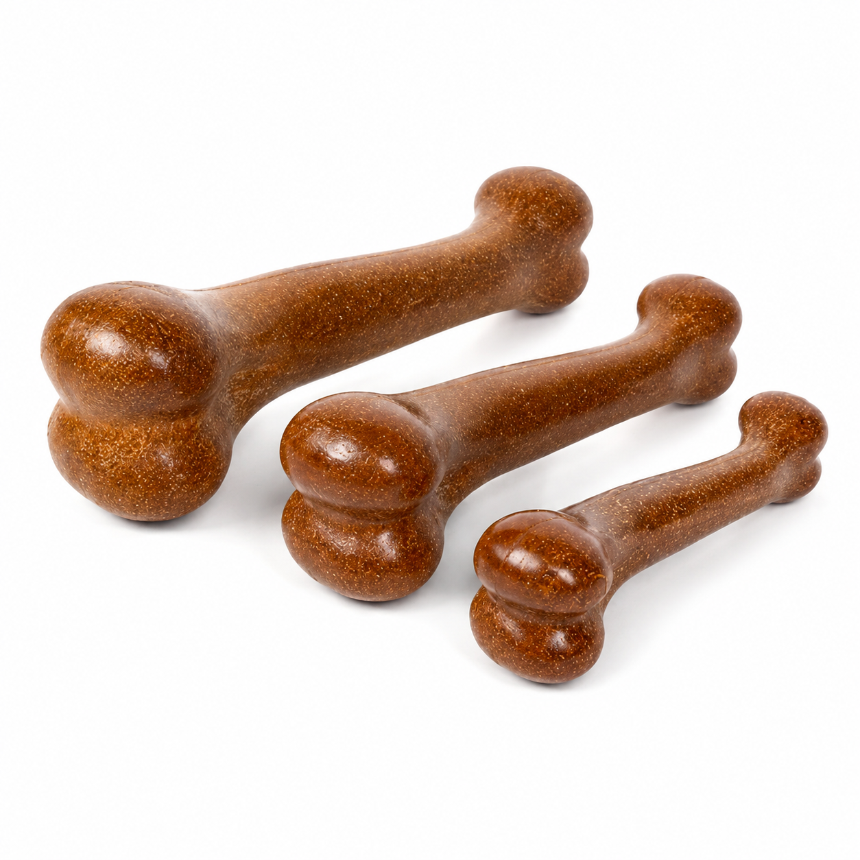 Three brown dog bones on a white background