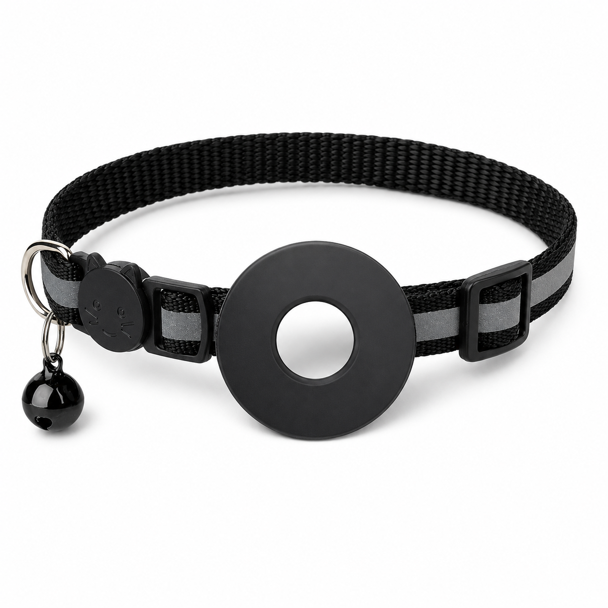 Black cat collar with a round plastic buckle and bell on a white background